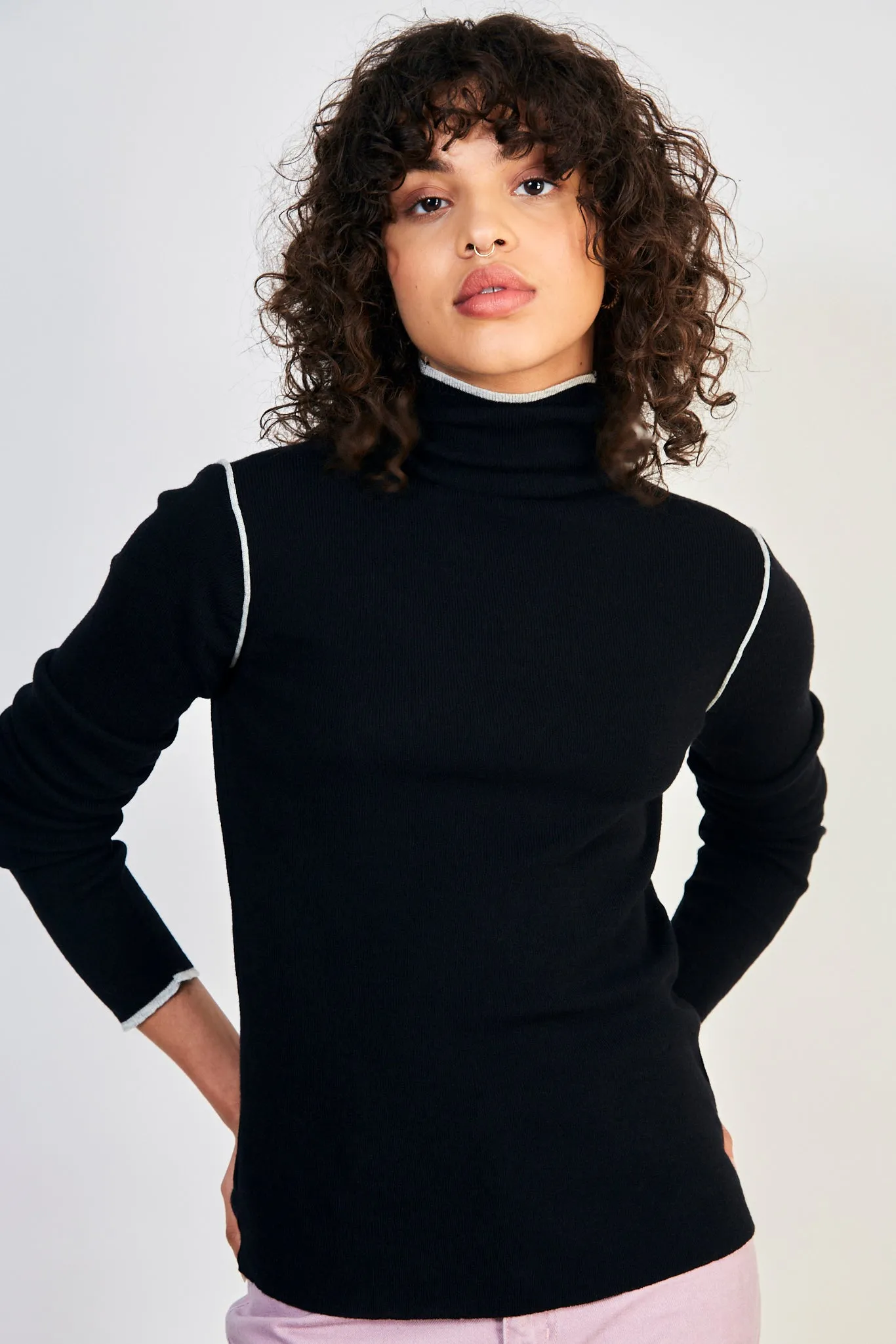 Black and white trim turtleneck top