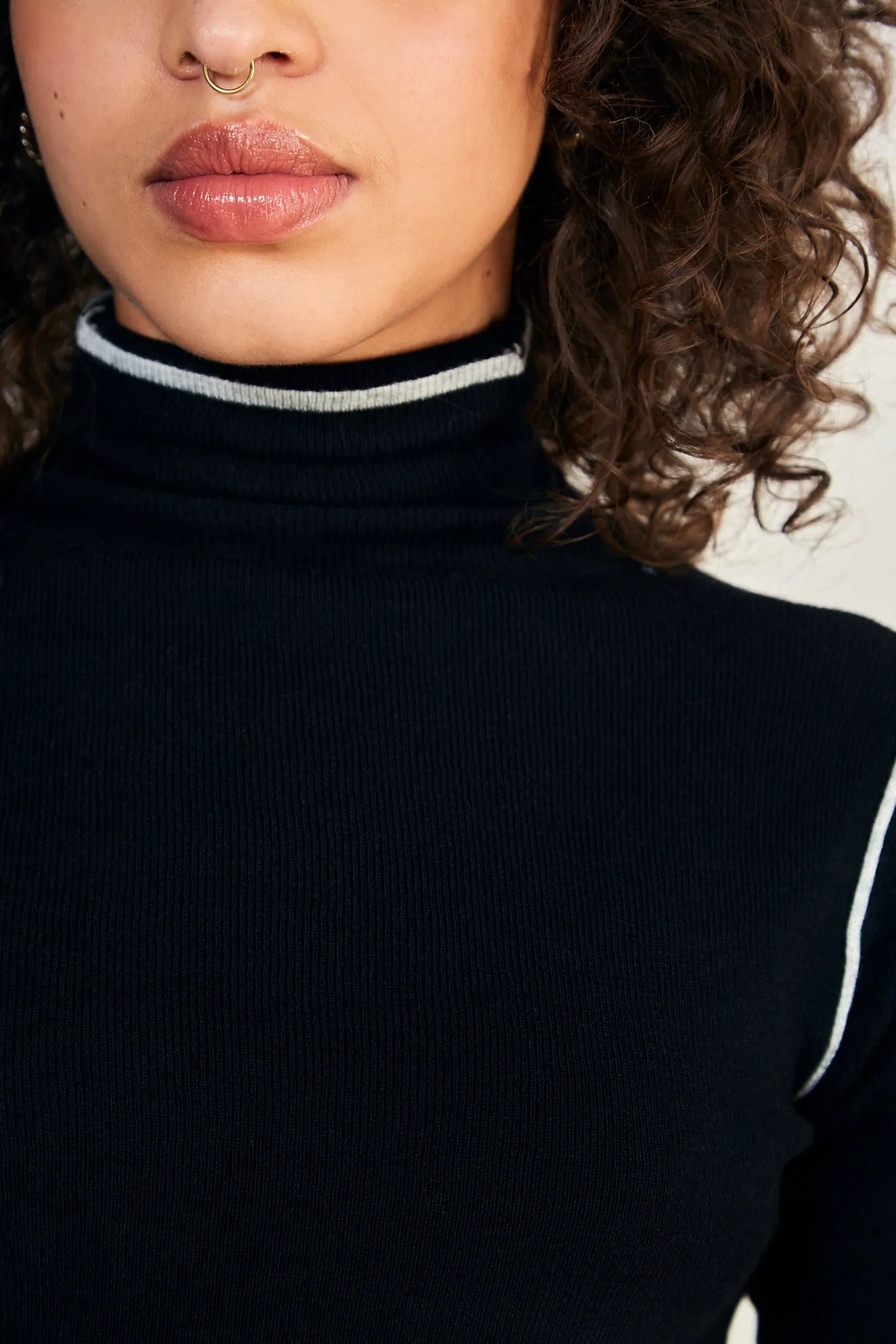 Black and white trim turtleneck top